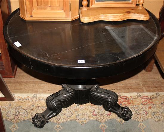 Circular ebonised table